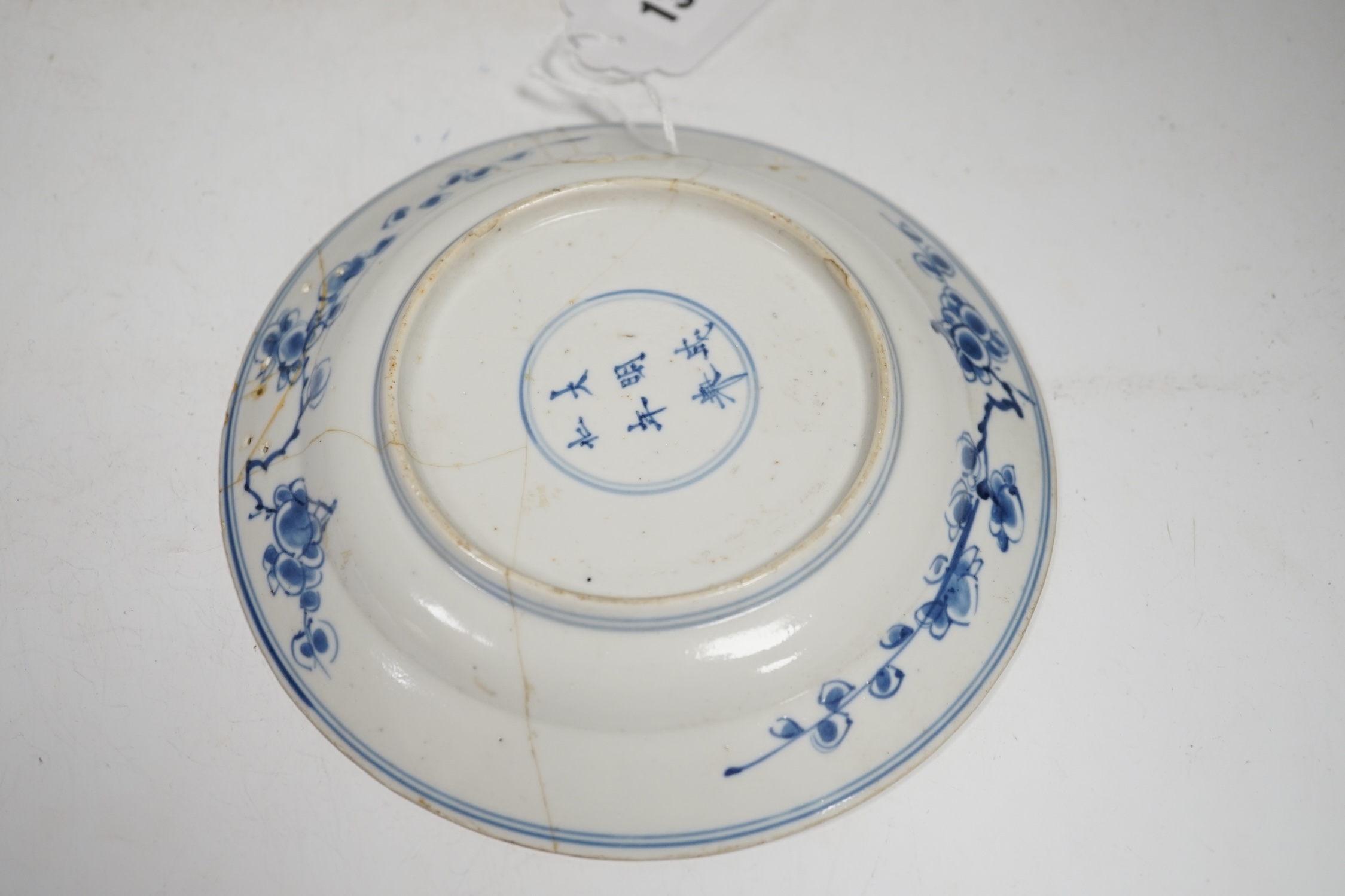 A Chinese blue and white teapot and cover, a prunus dish and an Imari patterned dish, all 18th century, teapot 19cm high. Condition - prunus dish and teapot cover chipped